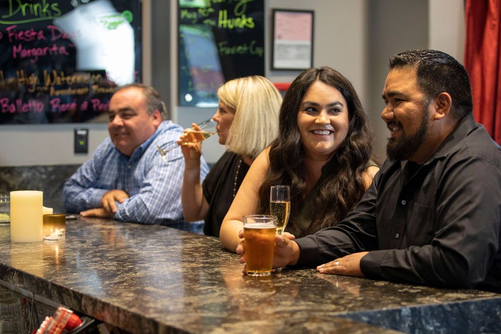 People drinking at a bar